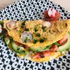 Omlet ze smażonymi rzodkiewkami i mozarellą