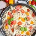 Spaghetti z polędwicą wiejską i pomidorkami
