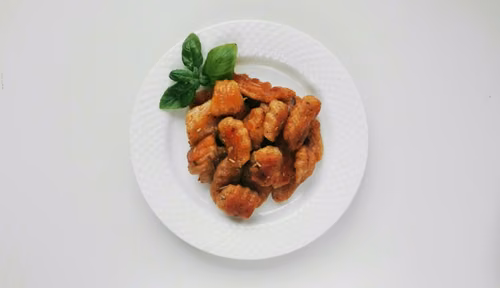 Gnocchi z pastą z suszonych pomidorów i żurawiny
