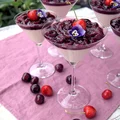 Panna Cotta z czereśniami w syropie z kwiatów cazrnego bzu