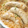 Biała kiełbasa pieczona w cebuli