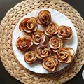 Różyczki z jabłek i ciasta francuskiego