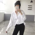 Luźna, biała koszula