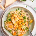 Risotto z dynią piżmową, zielonym groszkiem i kurczakiem