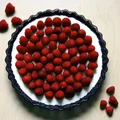 Tarta z panna cottą i malinami