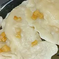 Pierogi z kapustą zasmażaną na słoninie i cebuli