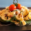 Makaron z rukolą, szynką parmeńską i pomidorkami koktajlowymi