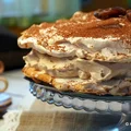 Bezowy tort dacquoise z daktylami i orzechami