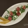 Melon z serem pleśniowym zawinięty w szynkę szwarcwaldzką