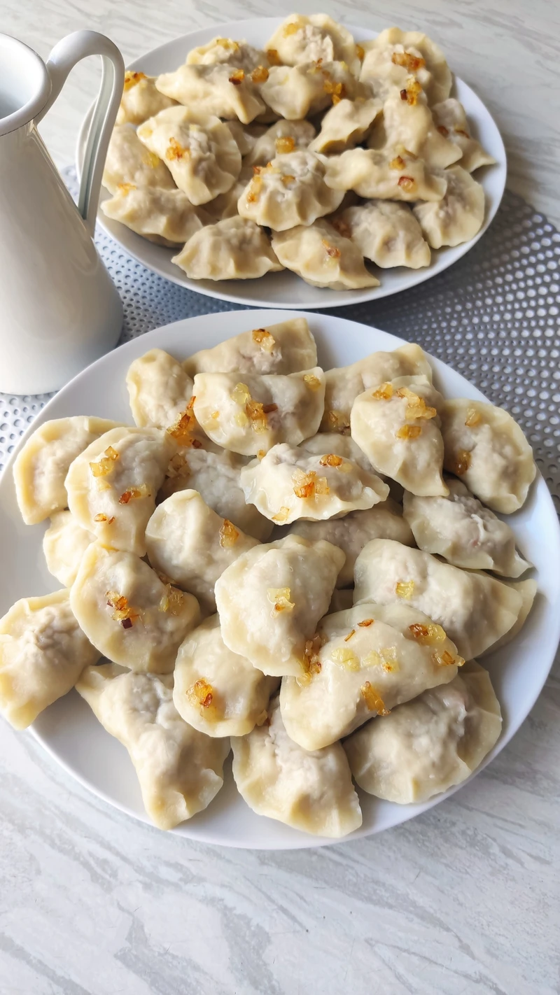 Pierogi z mięsem i kapustą kiszoną