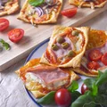 Mini pizze z ciasta francuskiego z szynką