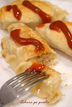 Pierogi z mięsem i kapustą kiszoną