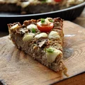 Zapiekanka z kaszy manny, pieczarek, mięsa mielonego, z pomidorkami i mozzarellą