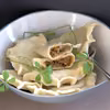 Pierogi z boczniakami i kiszoną kapustą duszoną w cydrze
