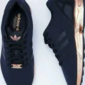 Adidasy ze złotą podeszwą