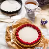 Fit tarta bez pieczenia z musem malinowym i białą czekoladą z kokosa