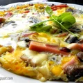 Serowy omlet z pieczarkami