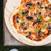 Pizza z szynką i pieczarkami