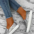 Błyszczące slip-on