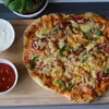 Pizza orkiszowa pieczona na kamieniu