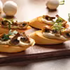 Bruschetta z pieczarkami i serkiem