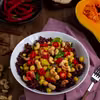 Curry z dynią, ciecierzycą, szpinakiem i orzechami nerkowca