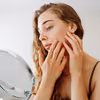Zmiany skórne po zimie - kiedy iść do dermatologa?