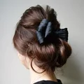fryzura z kokardą