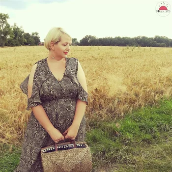 Sukienka maxi w zwierzęce wzory. Wyszczuplające wolanty