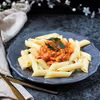 Penne Z Sosem Pomidorowo Pieczarkowym