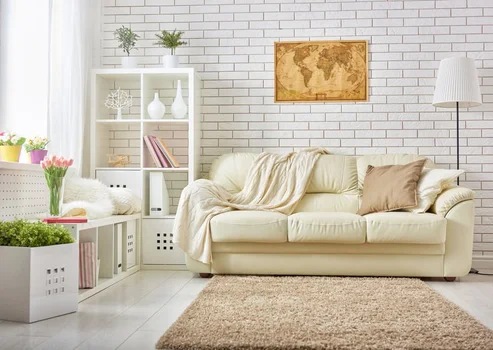 Inspiracja wnętrzarska: kremowo-biały salon z bajki