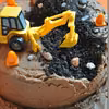 Tort z koparką