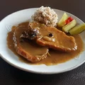 Schab duszony w sosie własnym