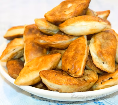 Pierogi drożdżowe z kapustą i grzybami
