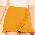 Żółta spódniczka na zakładkę