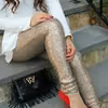 legginsy w cekinach