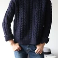 sweter ze wzorem warkocza