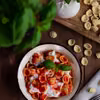 Orecchiette z pomidorami i burratą