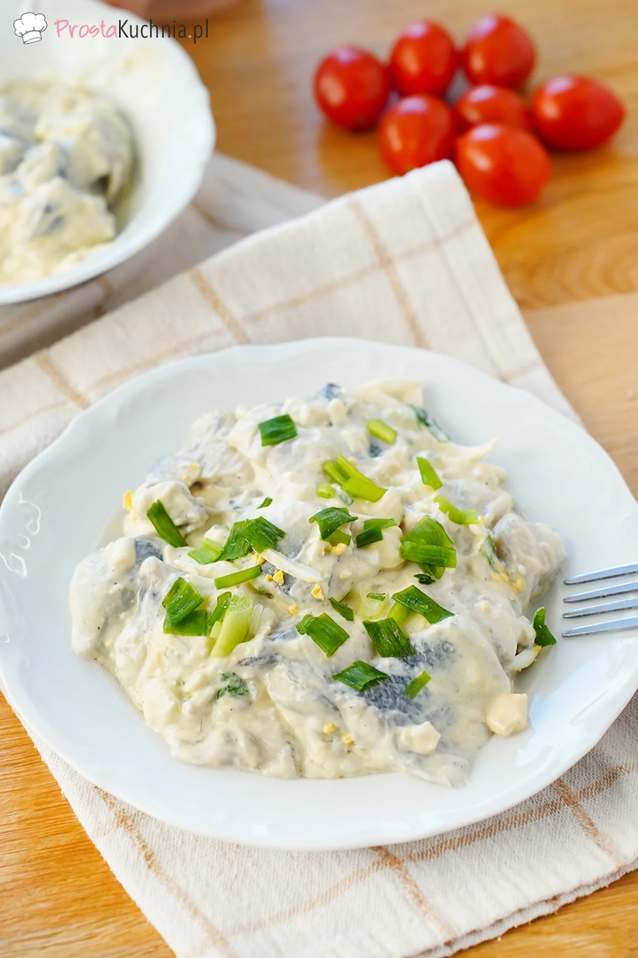 Śledzie z jajkiem w sosie śmietanowym