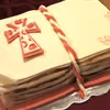 Tort komunijny w kształcie książki