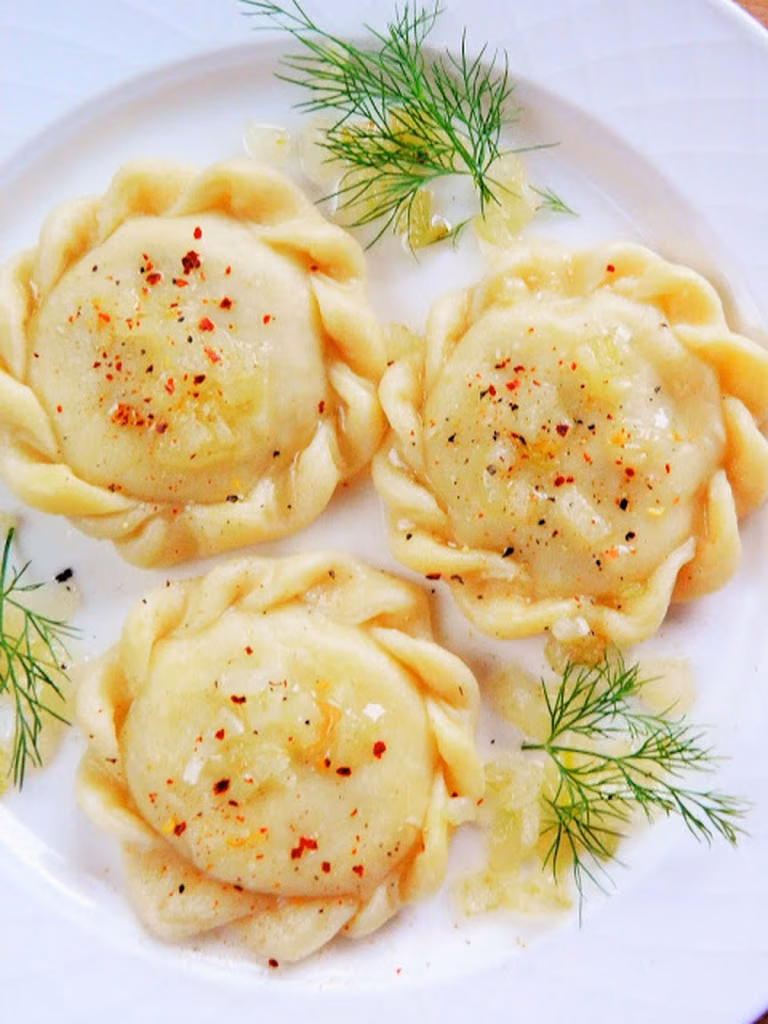 Pierogi z ziemniakami i kapustą kiszoną