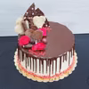 Tort chałwowo - waniliowy z frużeliną malinową