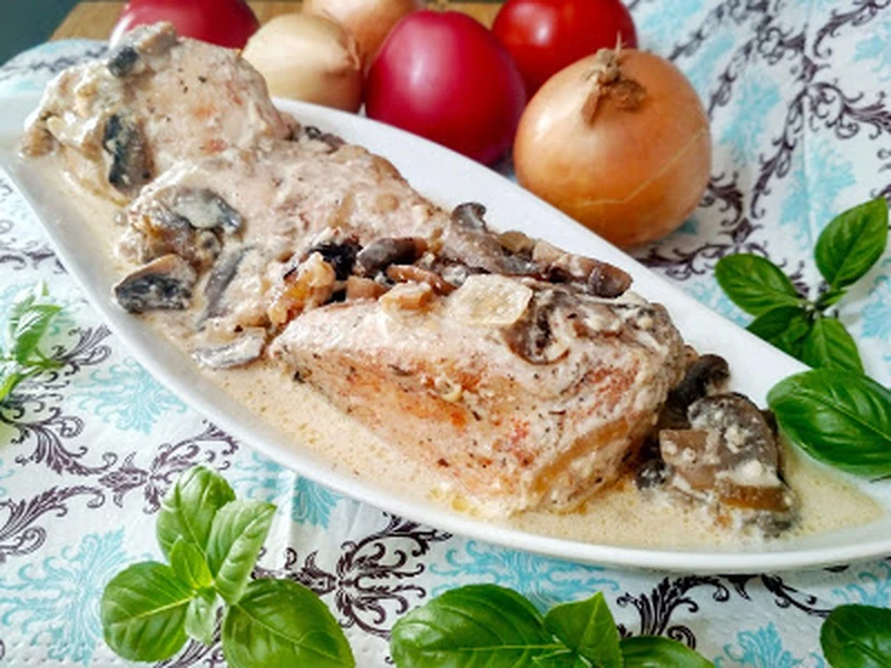 Kurczak zapiekany z pieczarkami i śmietaną