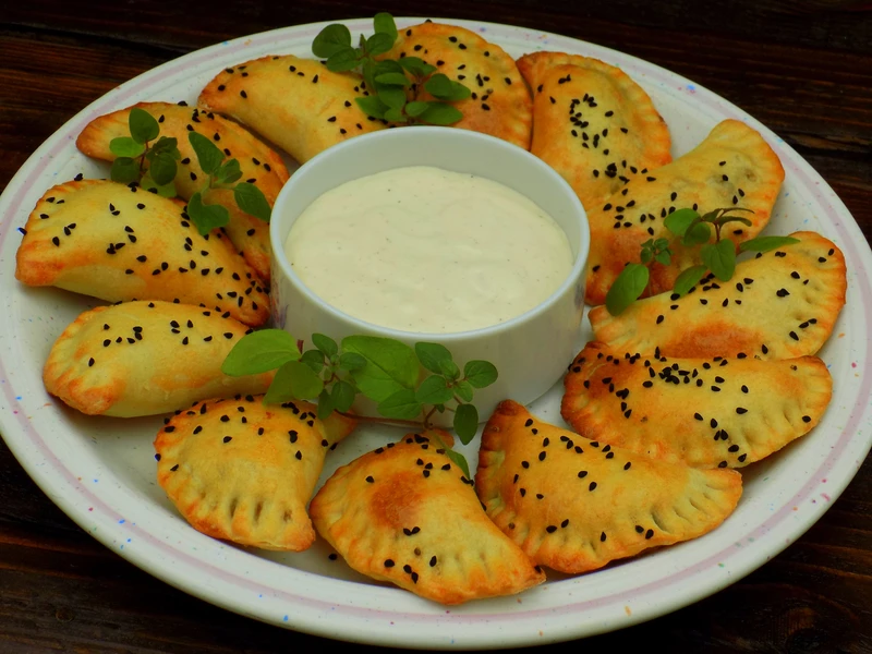 pieczone pierogi z kapustą i kaszą