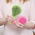 Czy warto kupić magiczną szczotkę do włosów? Tangle Teezer vs Michel Mercier