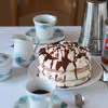 Kremowy torcik bezowy z ganache czekoladowym - idealny do kawy.