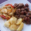 Karkówka zapiekana z pieczarkami