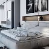 Przytulna sypialnia z wygodnym łóżkiem