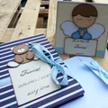 Zestaw dla dziecka: album do zdjęć i życzenia.