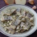 Śledzie w oleju z majerankiem i czosnkiem